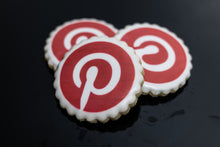 Load image into Gallery viewer, Round scalloped sugar cookie with Pinterest logo printed on white icing