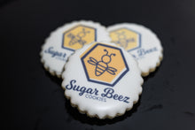 Load image into Gallery viewer, Round scalloped cookie with Sugar Beez logo printed on white icing.