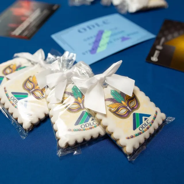 Logo cookies individually wrapped and finished with a bow